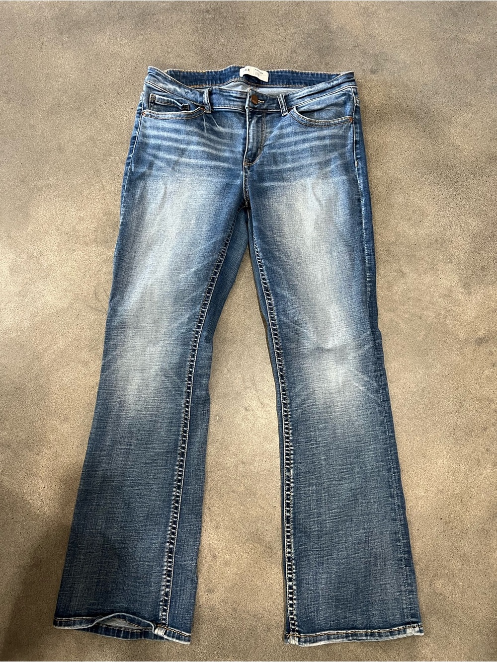 Buckle Women's Distressed Light-Medium Blue Bootcut Jeans